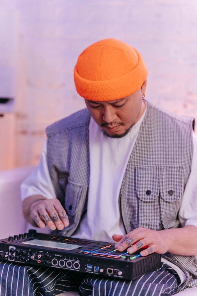 Man in Orange Knit Cap and Gray Pinstripe Dress Shirt